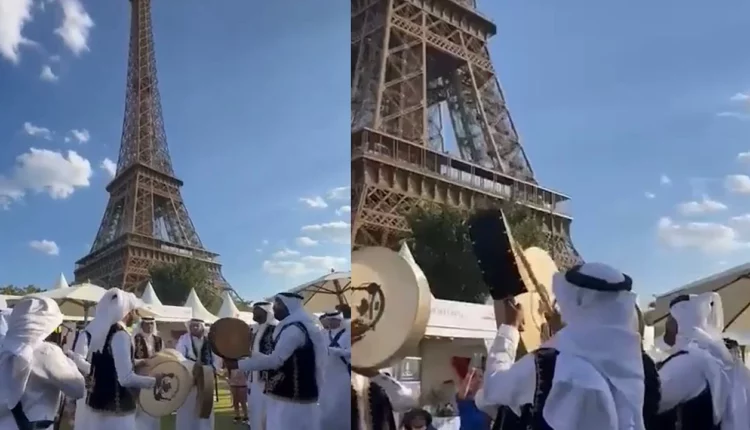 فرقة سعودية تؤدي رقصة العرضة أمام برج إيفل في باريس